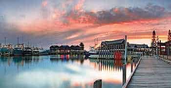 Fremantle_350x180_50 view of Fremantle Port in Western Australia showing the jetty, fisher boats and restaurants along the water