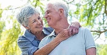 HappyCouple_350 180_80-min happy senior woman embracing her husband